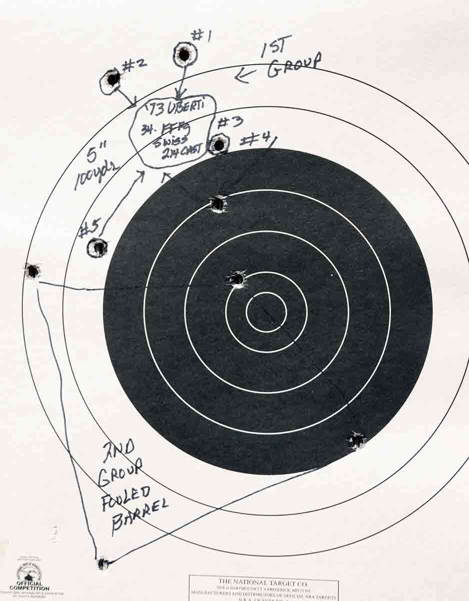 This photo demonstrates how black- powder fouling can degrade accuracy in repeating rifles. The top group of five shots are numbered in order of firing. The bottom group was fired after the rifle sat, allowing the black powder fouling to harden. The distance was 100 yards.